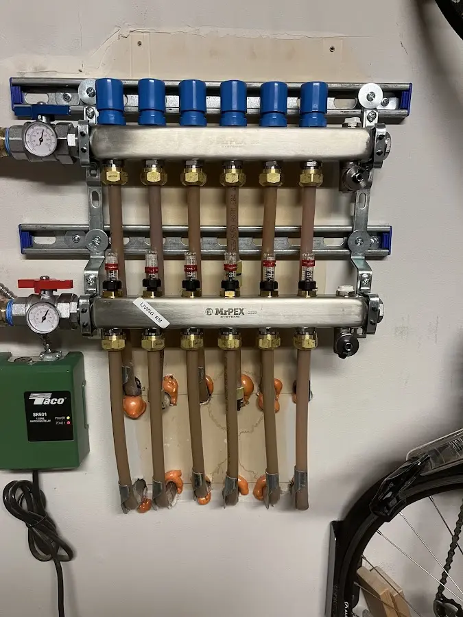 Plumber performing Water Heater Repair at a residential property in Piedmont